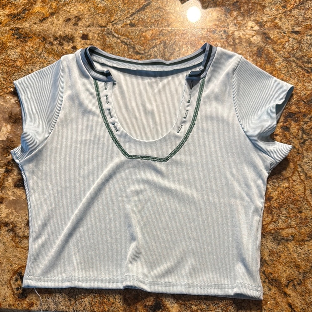 Amazon Blue Crop Top with Cap Sleeves and Cut Out Design